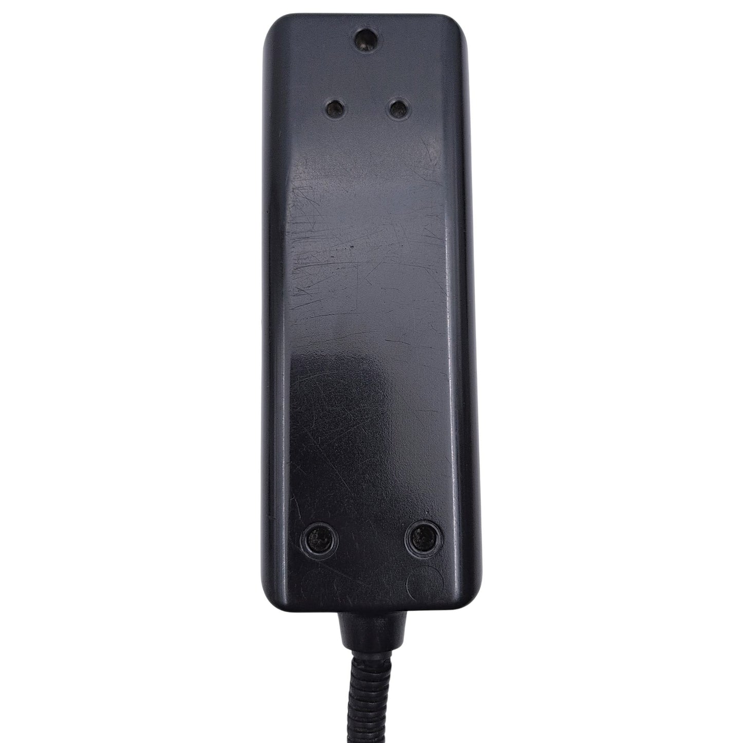 closeup of the back of the remote hand control. Also shows 5 screw holes and the cable stay.