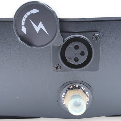 3 pin XLR charging port with cover slid upward to reveal port and 20 amp circuit breaker resest switch