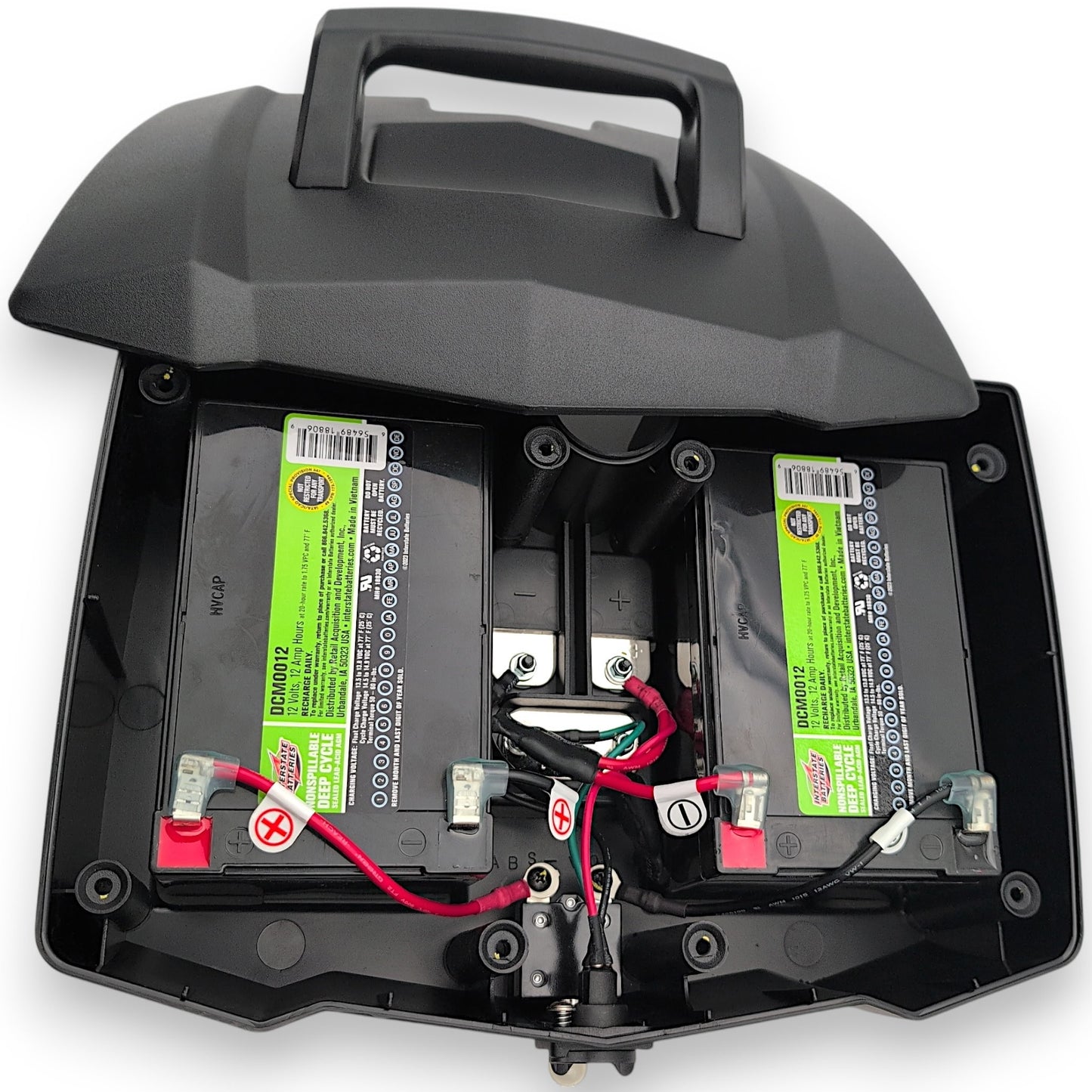 batteries box with lid removed showing DCM0012 batteries for that variant