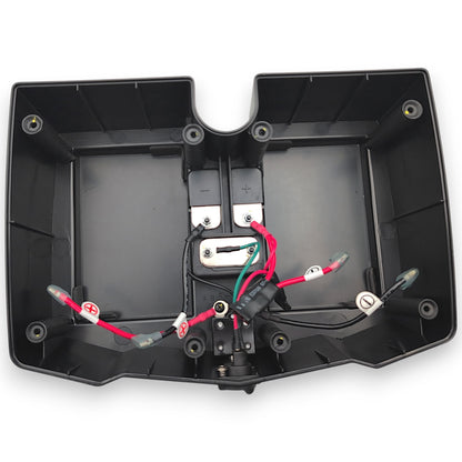 inside of battery box without any batteries installed. shows wiring, prots, fuses ,etcetera