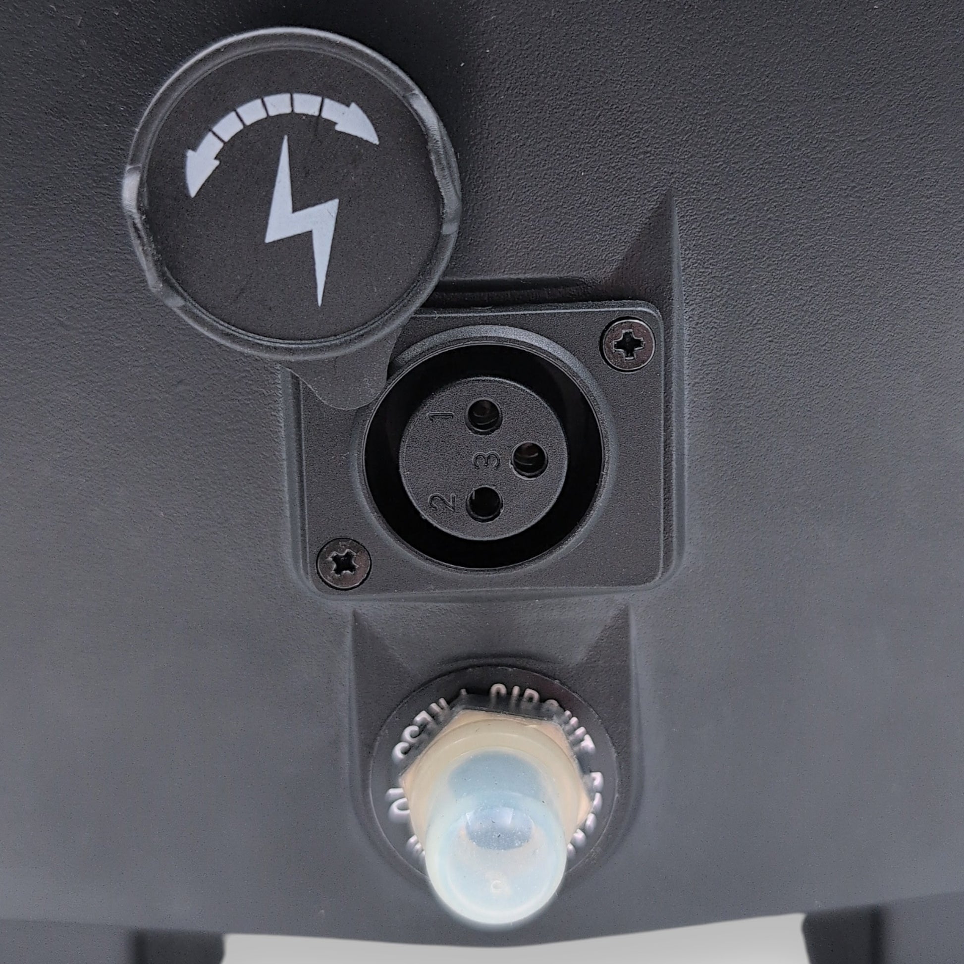 XRL charging port with cover removed and circuit breaker resest switch