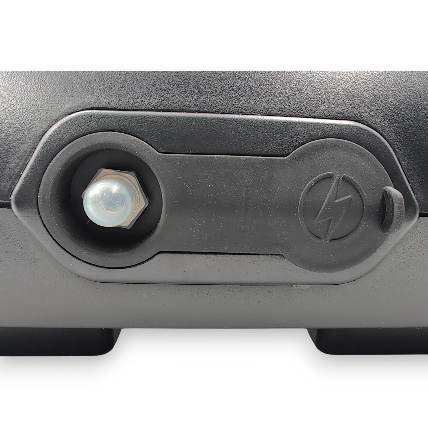 front closeup showing 30 amp circuit breaker reset switch and charging port location with cover on