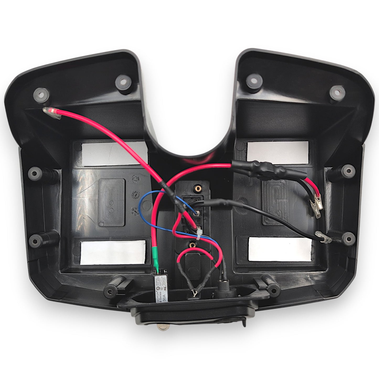 inside of battery box with out batteries installed, showing the boxes wiring and connectors