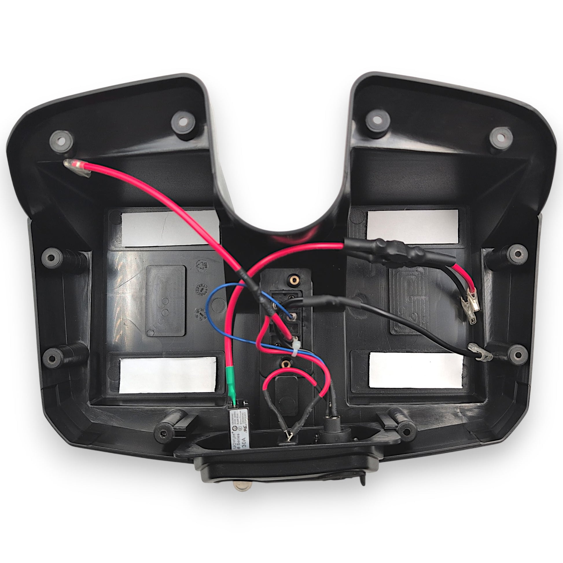 inside of battery box with out batteries installed, showing the boxes wiring and connectors