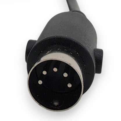 clseup of the remotes 5 pin connector. The casing around the connector is black