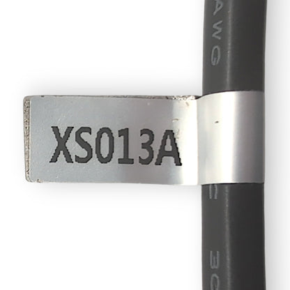 label found on cord. Number states: XS013A