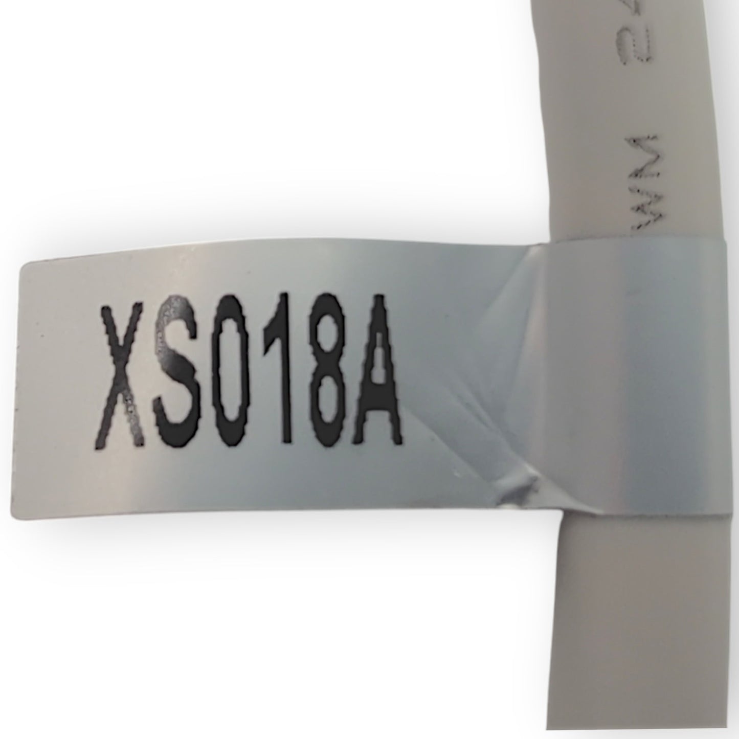 tag found on cord number on it says: XS018A