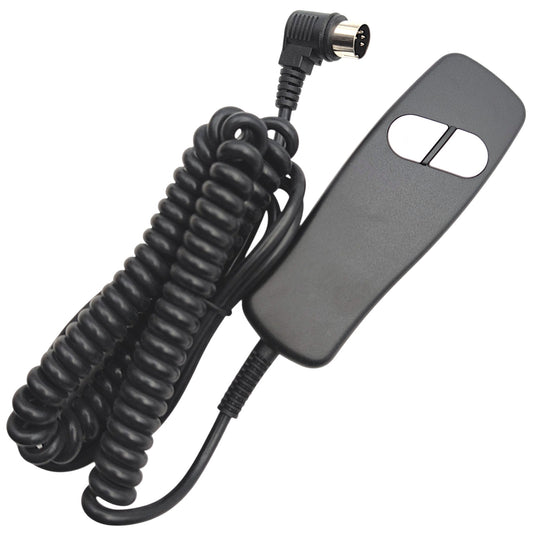 remote / hand control with 2 buttons and cable wound up. 90 degree connector and its 5 pins are in view