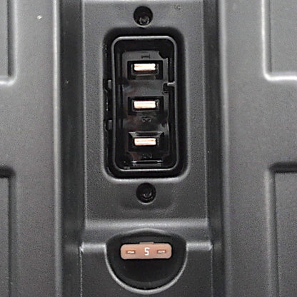 closeup of the battery boxes connector and 5 amp fuse on the bottom