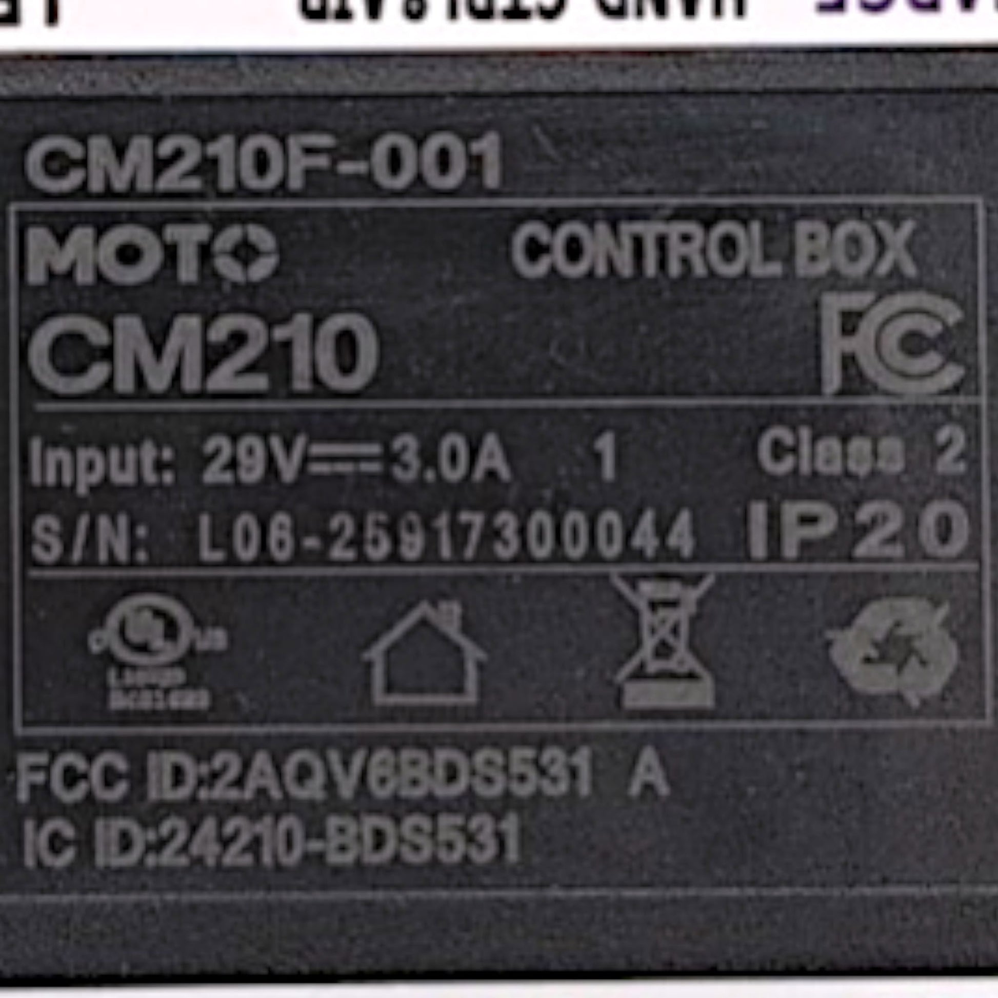 Product Label showing the Model Number: CM210F-001, Moto Control Box, base model id: CM210, Input 29 volts - 3.0 Amps