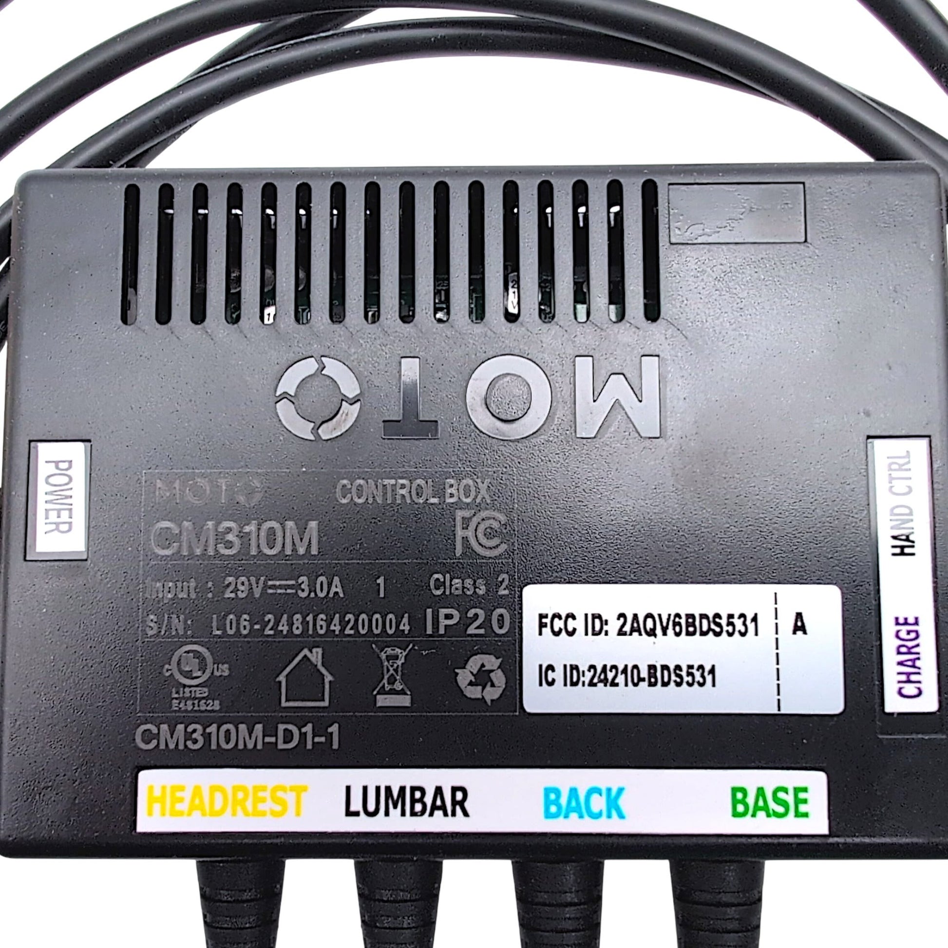 closeup of top with the product label and the labels for the 7 cables