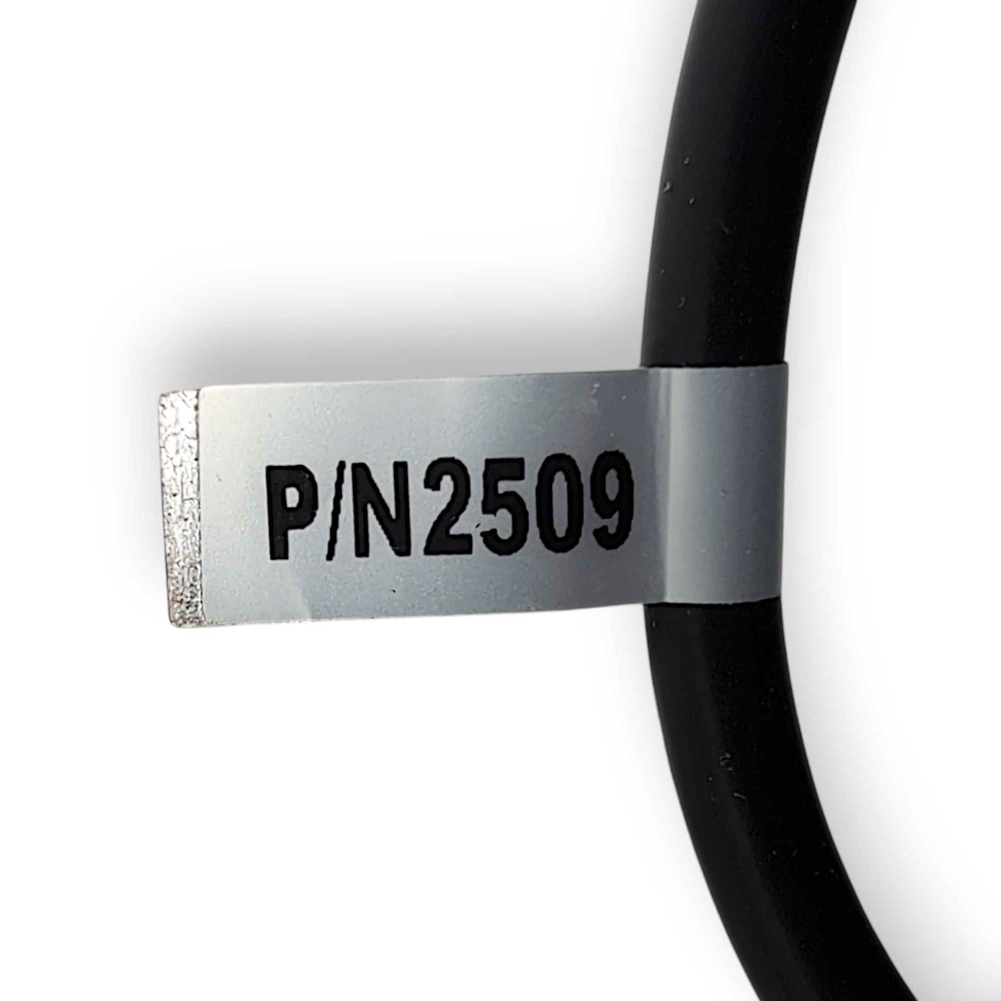 label found on cord near connector, showing part number 2509