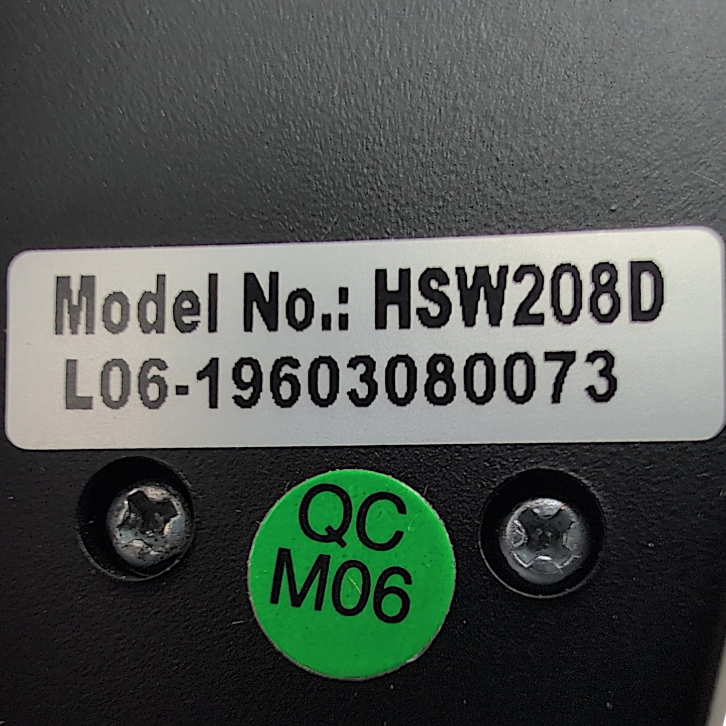 closeup of product label showing model number hsw208d and the serial number stating with L06