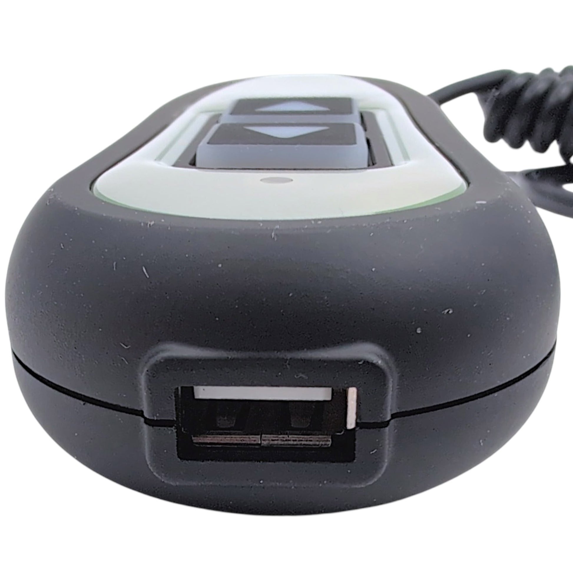 Top of the 2-button remote hand control. Closeup on the USB charging port.