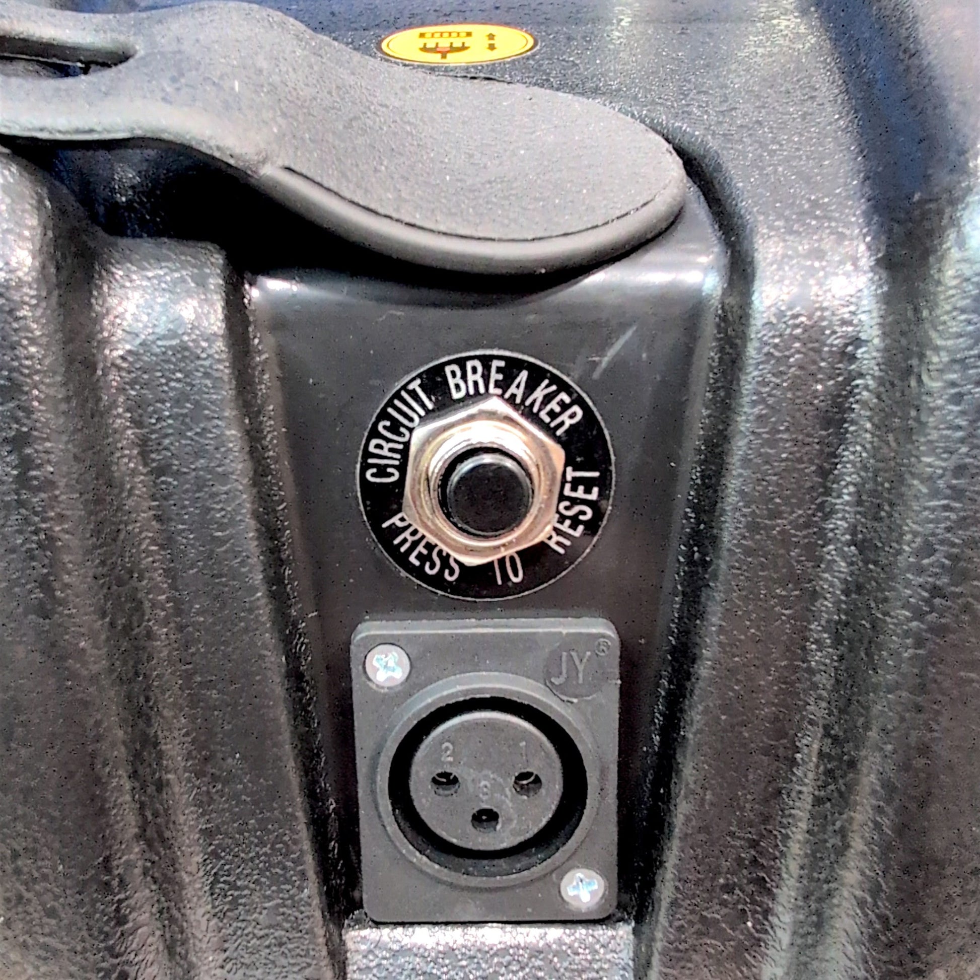 cover off front port. shows circuit breaker and 3-pin XLR Port